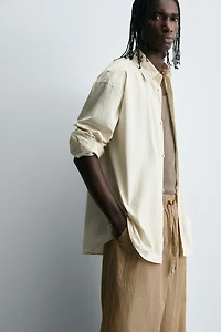 STRIPED OVERSIZED FIT PANTS