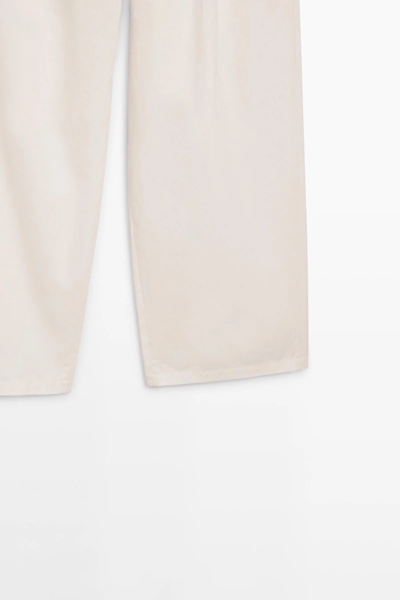 Pleated trousers with crossover fastening - STUDIO