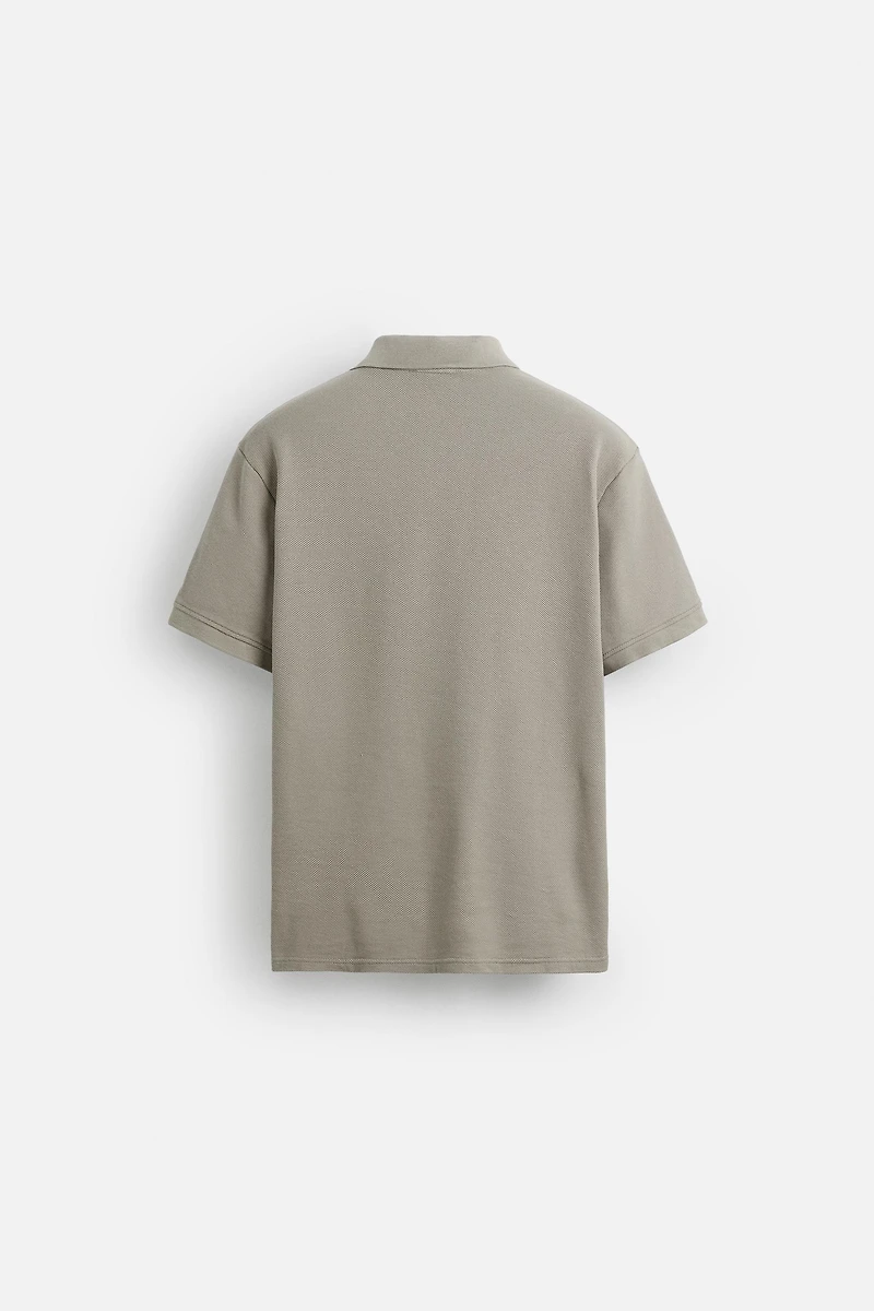 QUARTER ZIP POLO