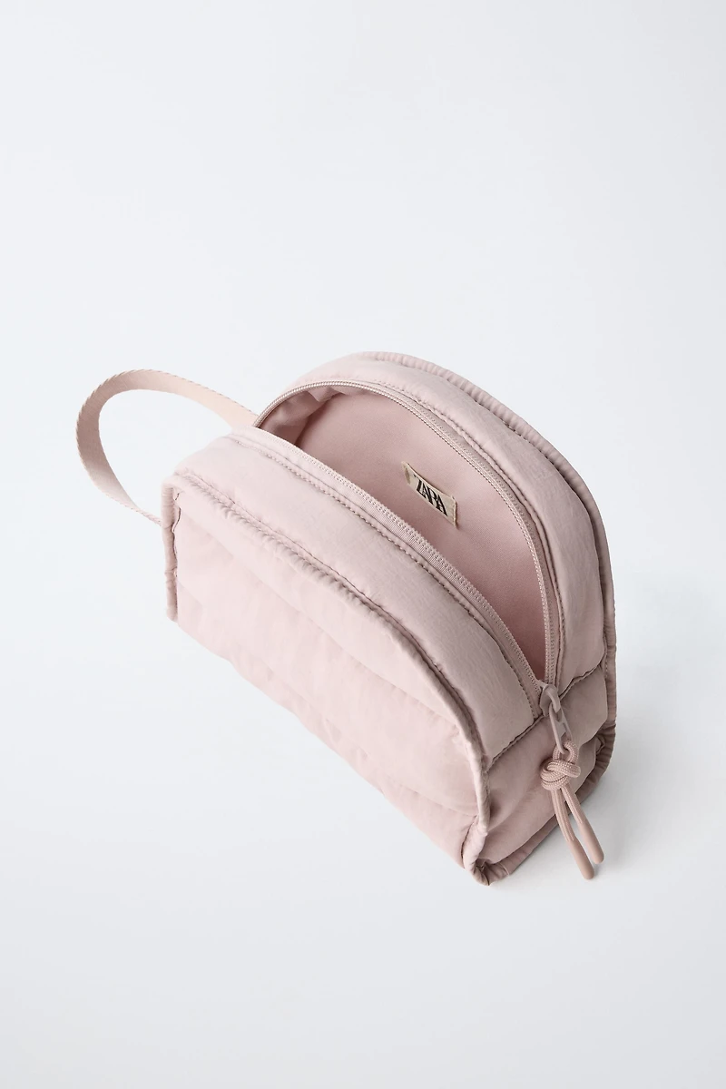 TROUSSE MATELASSÉE