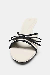 BOW HEELED SANDALS