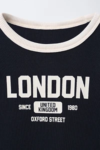ROBE CÔTELÉE À INSCRIPTION