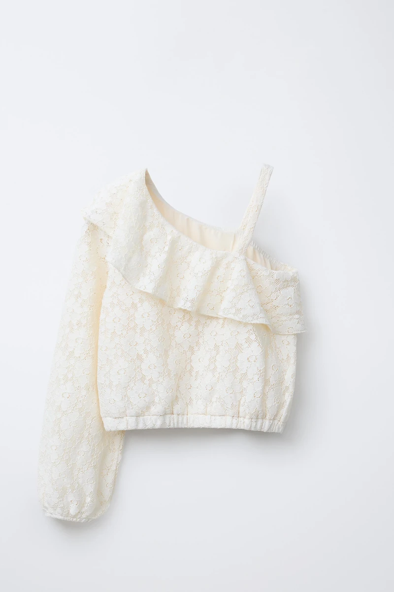 TOP ASYMÉTRIQUE VOLANT DENTELLE