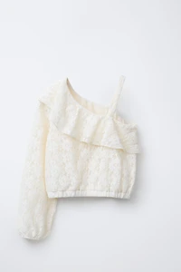 TOP ASYMÉTRIQUE VOLANT DENTELLE