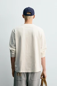 T-SHIRT MANCHES LONGUES À ÉCUSSONS CHAMPION ® X ZARA