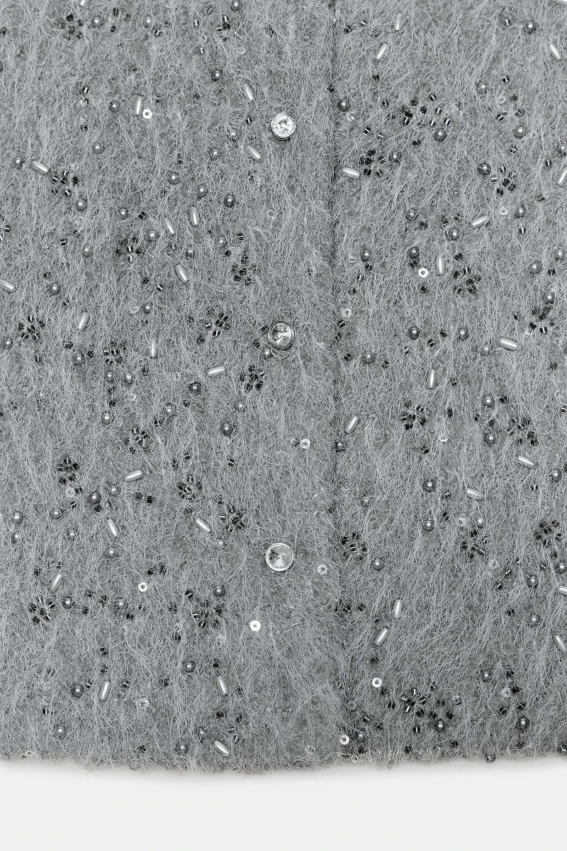 BLOUSON EFFET FOURRURE ET FANTAISIE