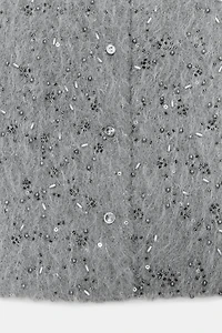 BLOUSON EFFET FOURRURE ET FANTAISIE