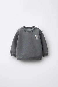 EMBROIDERED WASHED EFFECT SWEATSHIRT