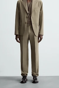 TEXTURED SUIT PANTS