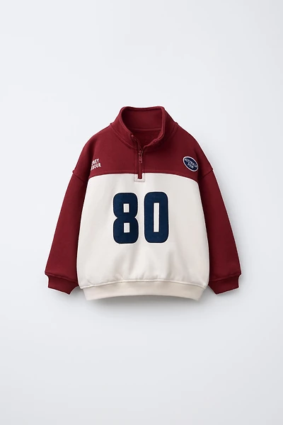 NUMBER ZIP SWEATSHIRT