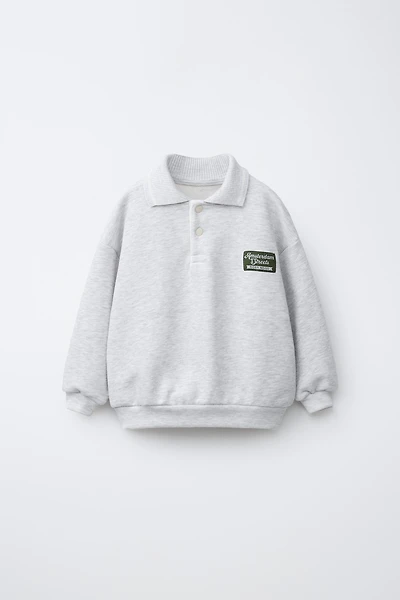 SWEAT POLO À ÉTIQUETTE BRODÉE
