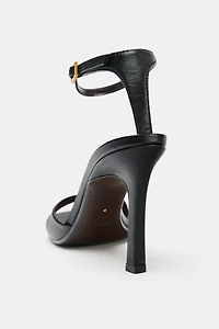 ASYMMETRIC LEATHER HEELED SANDALS