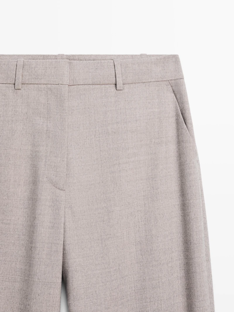 Wool blend trousers with buckle detail