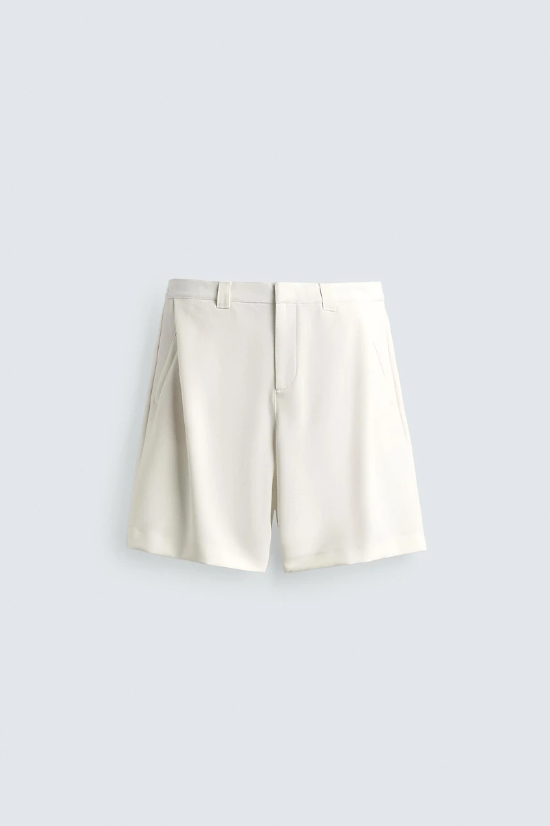 BERMUDA RELAXED FIT PLIS LATÉRAUX