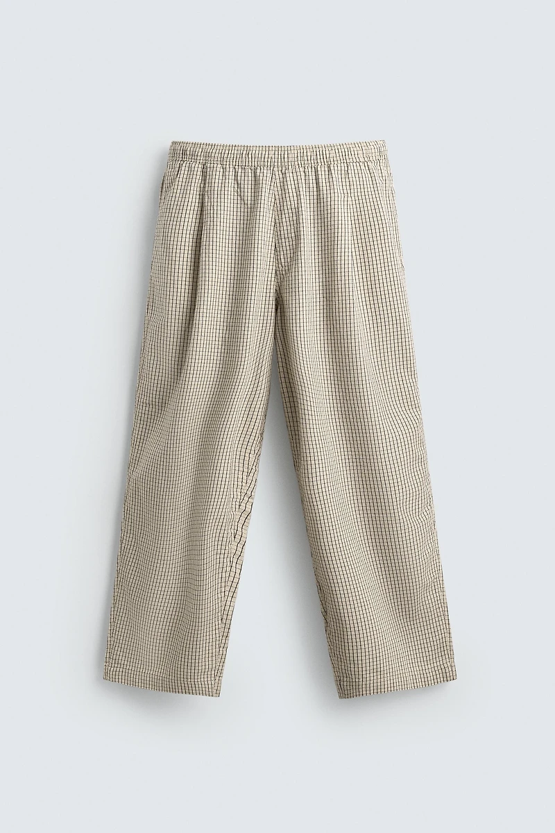 BALLOON FIT PLEATED PANTS
