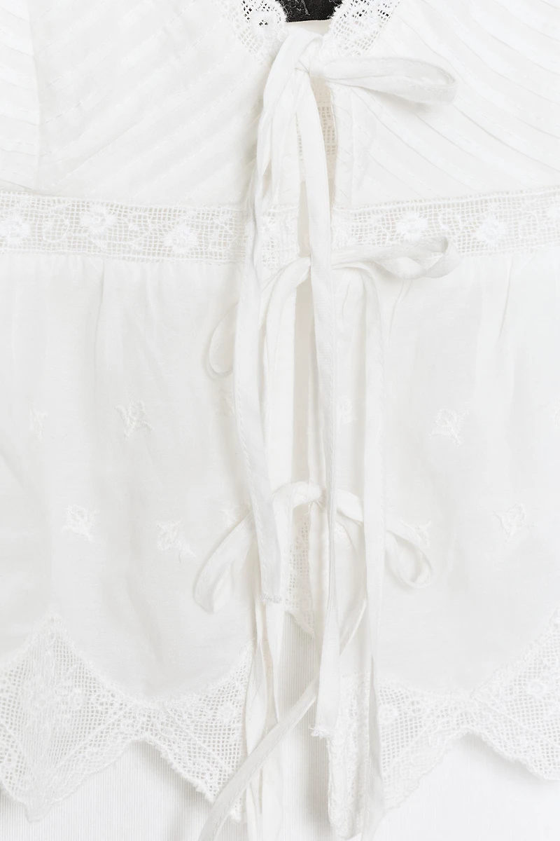 EMBROIDERED TIE-FRONT CAMISOLE