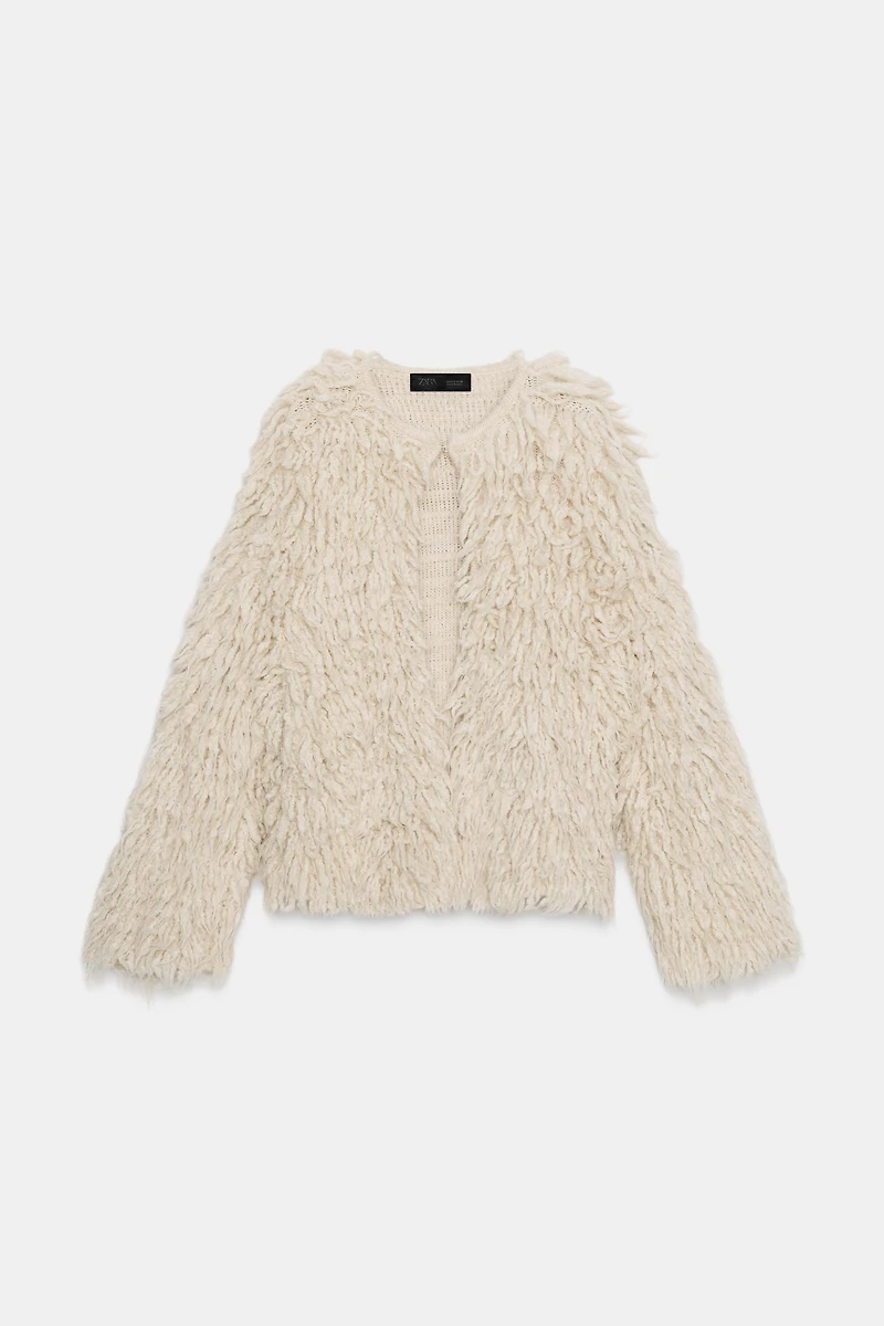 GILET EN MAILLE À FRANGES EFFET BROSSÉ