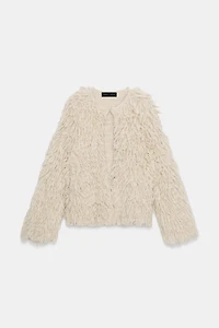GILET EN MAILLE À FRANGES EFFET BROSSÉ