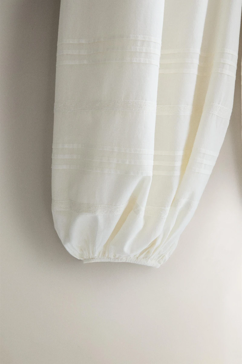 SMOCKED TROUSERS WITH LACE AND DRAWSTRINGS