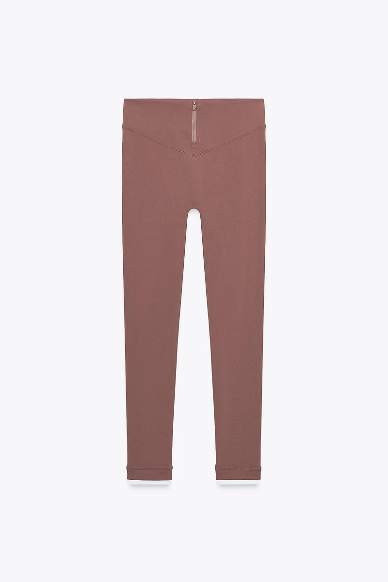 SEAMLESS ZIPPERED LEGGINGS
