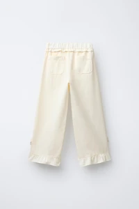 WIDE LEG PANTS WITH CROCHET FLOWER RUFFLES