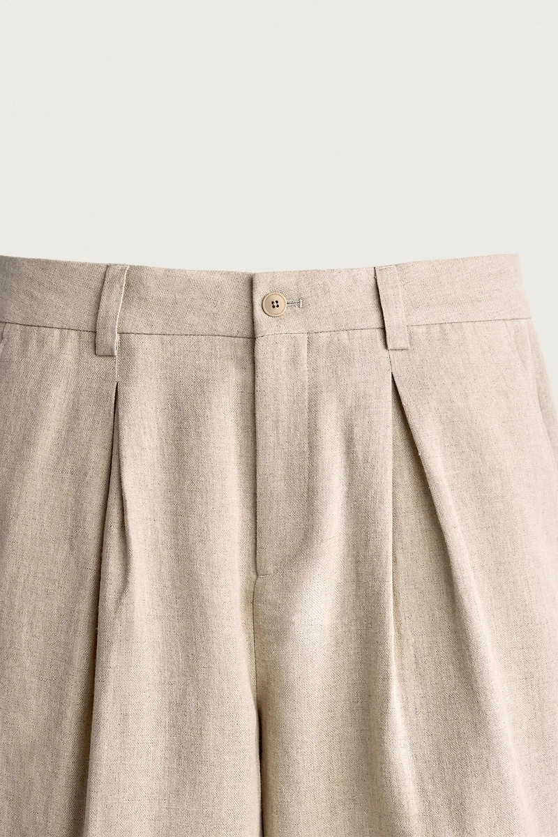 RELAXED FIT PLEATED SUIT PANTS