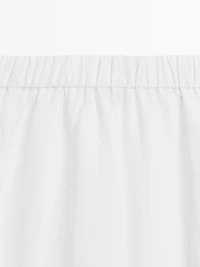 Flowing midi skirt with elastic detail