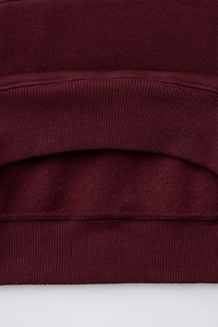 FLOCKED TEXT SWEATSHIRT