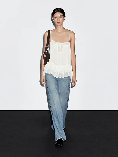 Flowing strappy top with ruffles