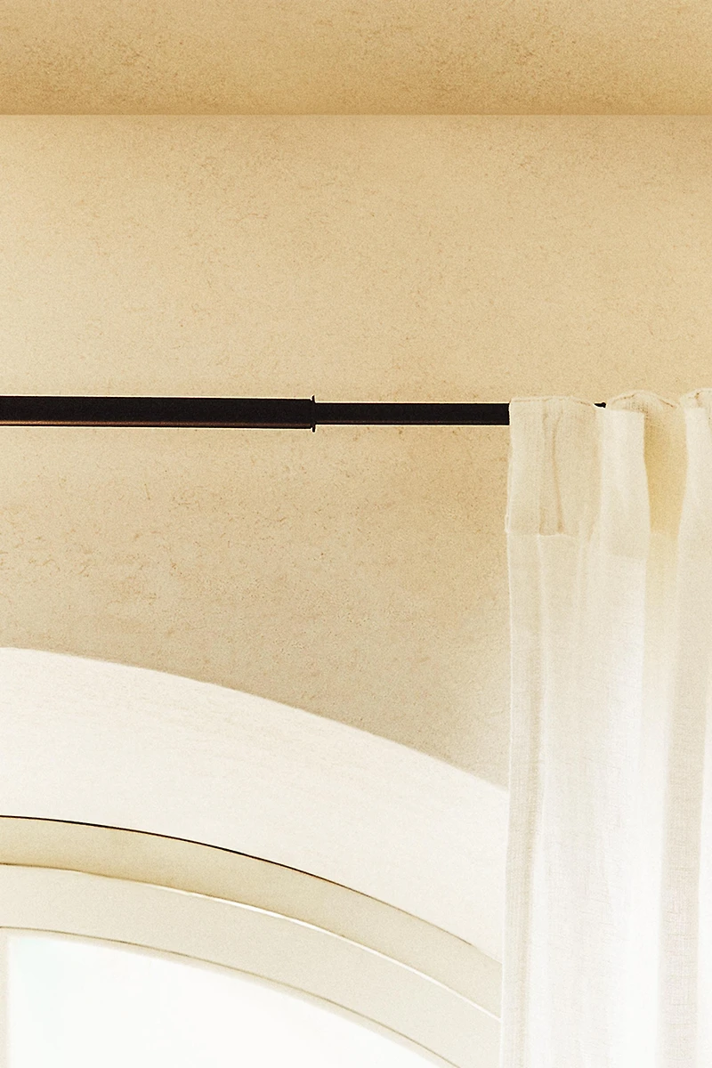 EXTENDIBLE METALLIC CURTAIN RAIL