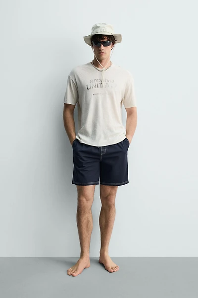 WASHED COTTON-LINEN T-SHIRT WITH TEXT