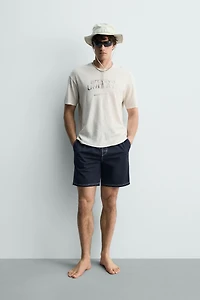 WASHED COTTON-LINEN T-SHIRT WITH TEXT