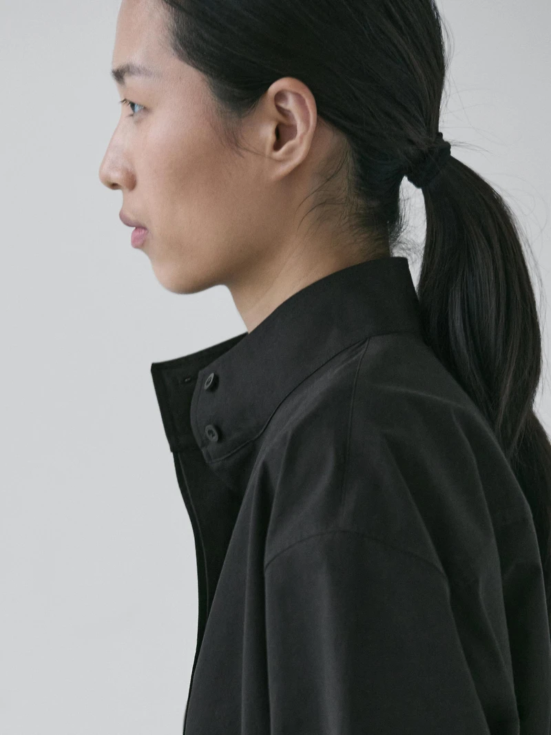 High neck shirt with strap detail