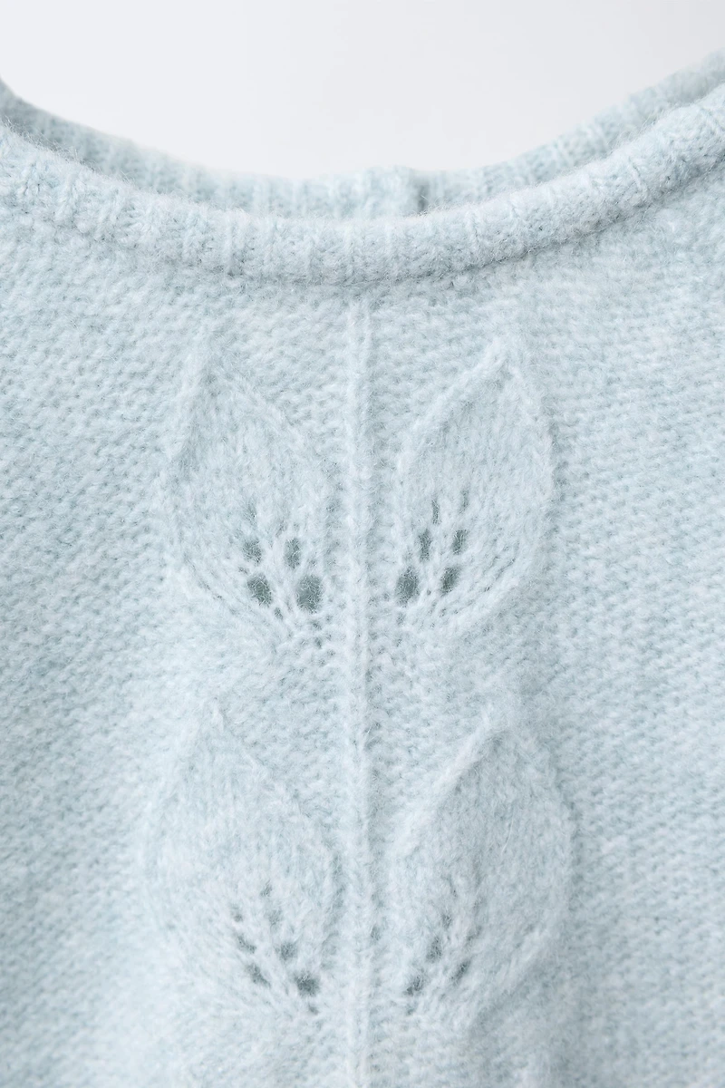 PULL EN MAILLE AVEC FEUILLES