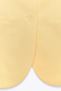 TOP GILET À BOUTONS