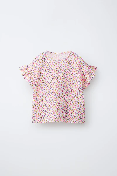 HAUT TEXTURÉ À FLEURS