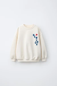 HEART AND TEXT PRINT SWEATSHIRT