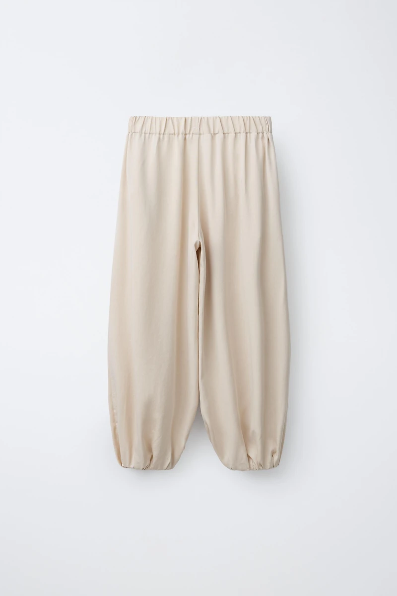 PANTALON BOMBACHO À PLIS
