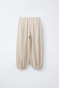 PANTALON BOMBACHO À PLIS