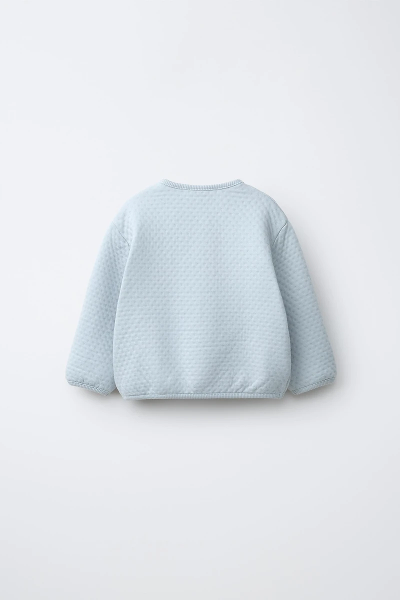 EMBROIDERED RUFFLY PADDED JACKET