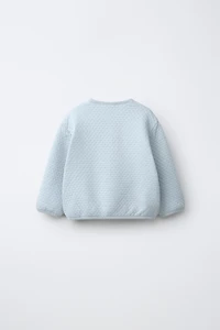 EMBROIDERED RUFFLY PADDED JACKET