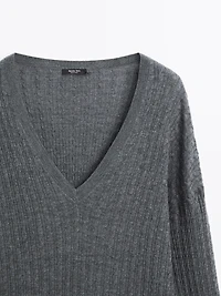V-neck cable-knit sweater