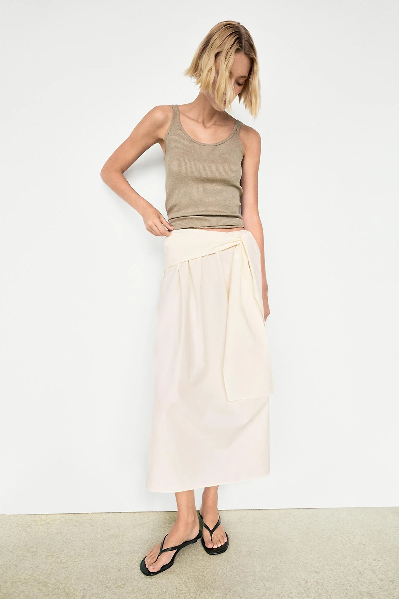 Flowing skirt with scarf detail