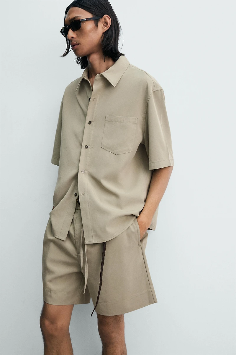 WASHED EFFECT RELAXED FIT SHORTS