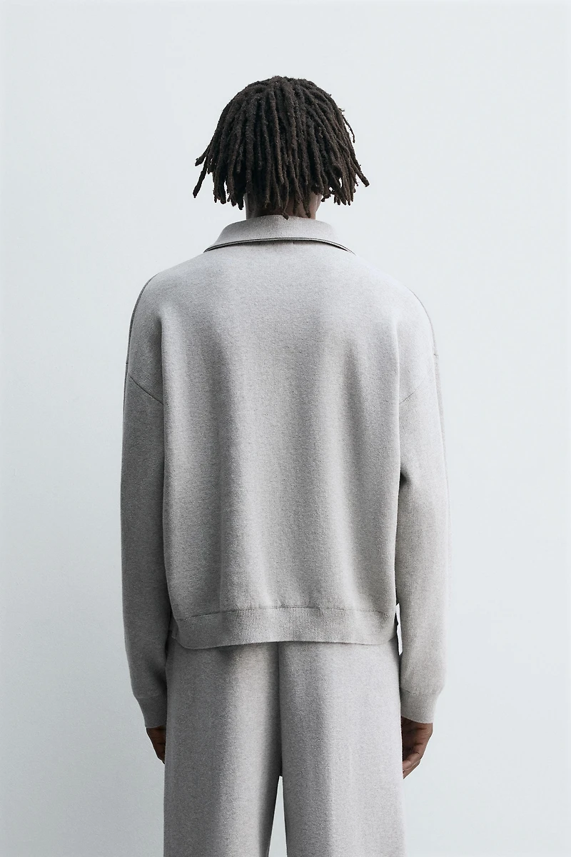 POLO EN MAILLE À COL ZIPPÉ
