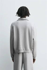 POLO EN MAILLE À COL ZIPPÉ