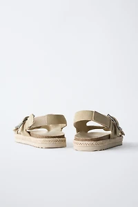 LEATHER SANDALS WITH JUTE BUCKLES