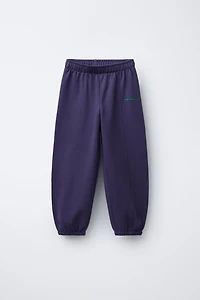 PANTALON DE JOGGING EN MOLLETON AVEC INSCRIPTION BRODÉE