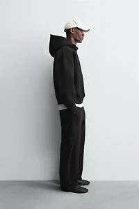 RAISED TEXT NEOPRENE EFFECT SWEATSHIRT