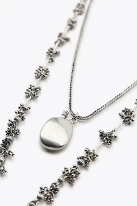 2-PACK NECKLACES WITH PIECES AND BOTTLE